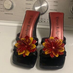 TWO LIPS/Black Heels with Red and Yellow Floral Accents
